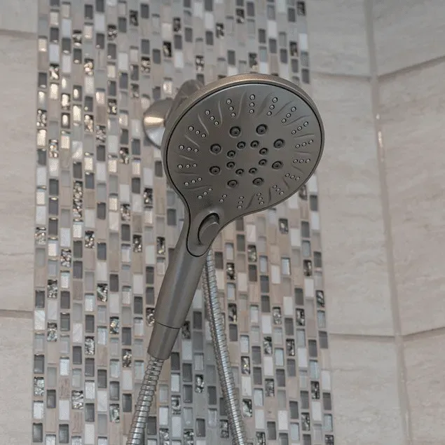 A close-up of a handheld shower head.